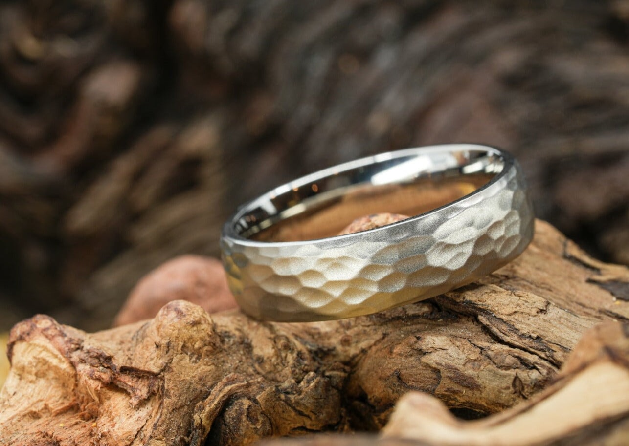 Hammered titanium clearance ring